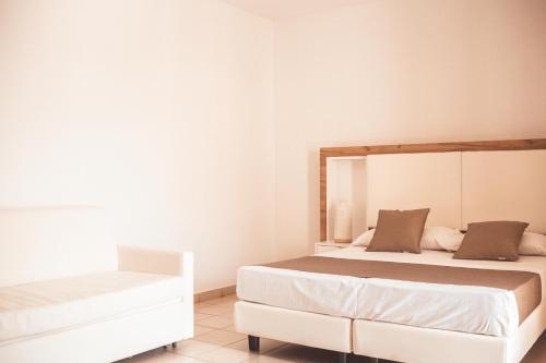 Ένα ή περισσότερα κρεβάτια σε δωμάτιο στο Hotel Al Paradise