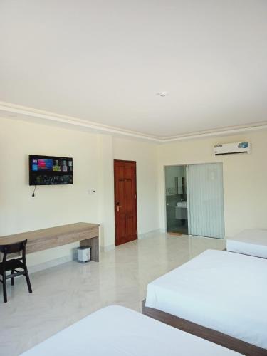 Postel nebo postele na pokoji v ubytování Hoàng Anh Côn Đảo Hotel