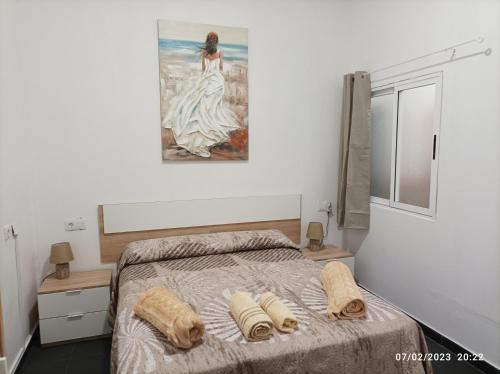 Postel nebo postele na pokoji v ubytování Casa La Isleta, entre el puerto y la playa Las Canteras