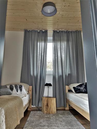 Cama o camas de una habitación en Chata Pinie