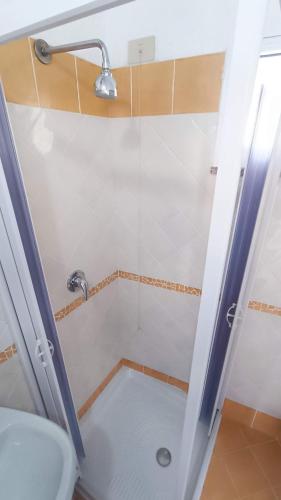 a bathroom with a shower with a toilet at Hotel Casa Nicola in Ischia