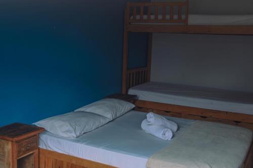 Una cama o camas en una habitación de Santo hostel