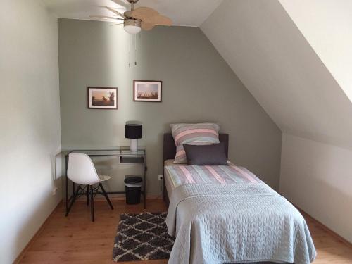 Кровать или кровати в номере Kleines Zuhause