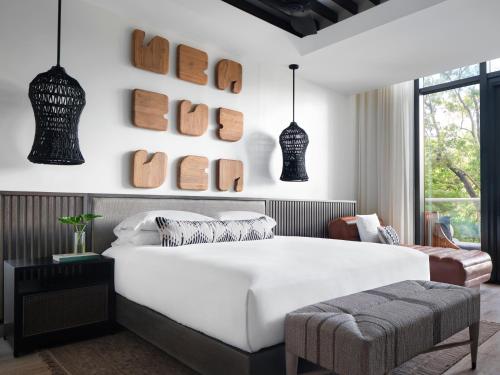 Voodi või voodid majutusasutuse Kimpton - Grand Roatan Resort and Spa toas