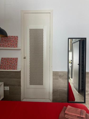 Postel nebo postele na pokoji v ubytování Estudio casa Lola