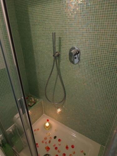 a bathroom with a shower with a tub and a shower at B&B Linea Verde in Milan