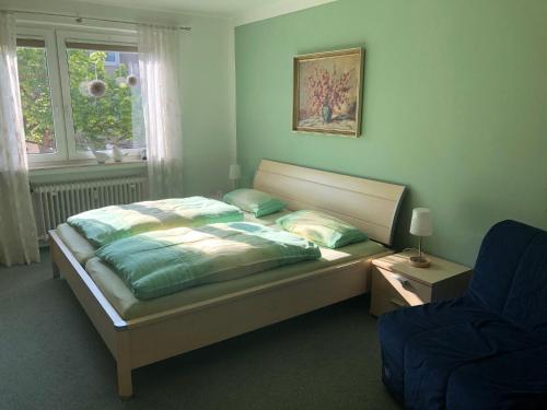 Postel nebo postele na pokoji v ubytování Ferienwohnung-Wesertal