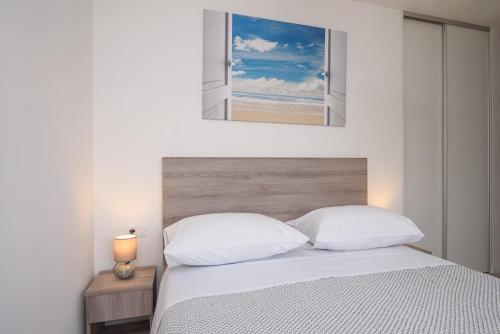 Katil atau katil-katil dalam bilik di Villa Barbara & Zoran with heated swimming pool