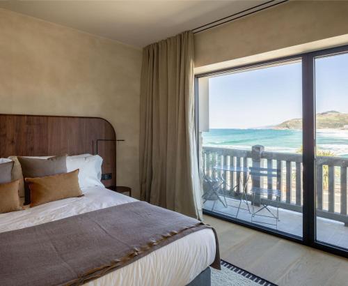 Ένα ή περισσότερα κρεβάτια σε δωμάτιο στο Hotel Ur Bare