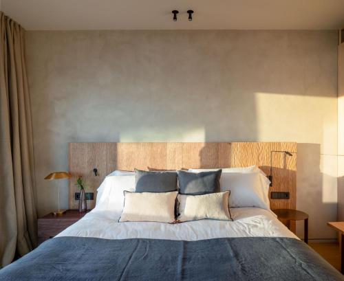 Ένα ή περισσότερα κρεβάτια σε δωμάτιο στο Hotel Ur Bare