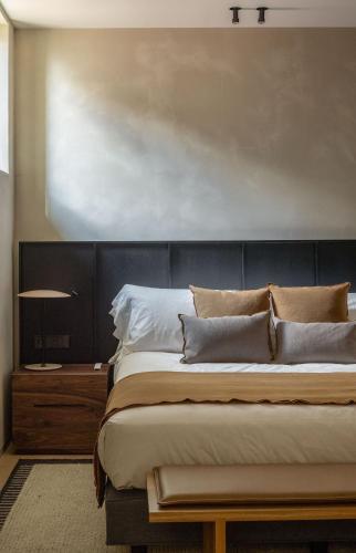 Ένα ή περισσότερα κρεβάτια σε δωμάτιο στο Hotel Ur Bare