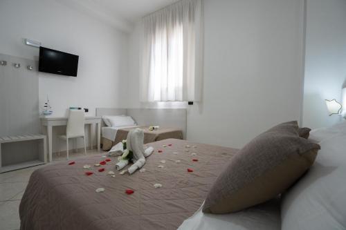 Katil atau katil-katil dalam bilik di B&B Il Gabbiano