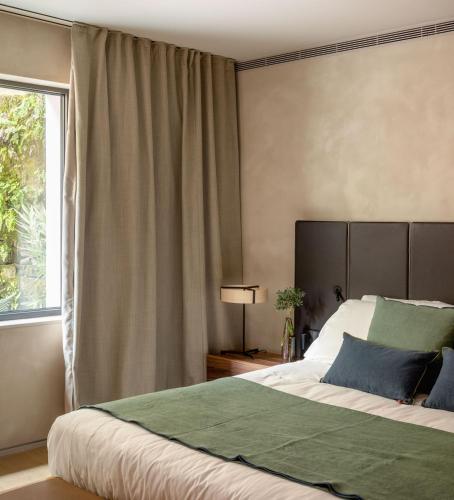 Ένα ή περισσότερα κρεβάτια σε δωμάτιο στο Hotel Ur Bare