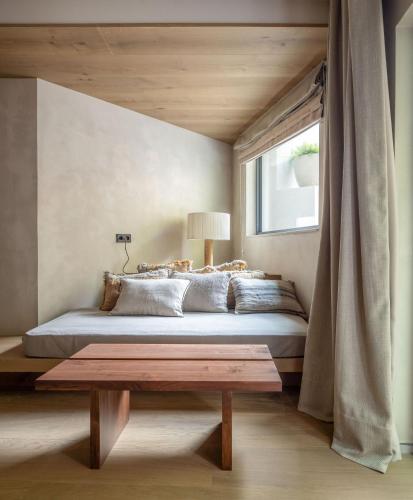 Ένα ή περισσότερα κρεβάτια σε δωμάτιο στο Hotel Ur Bare