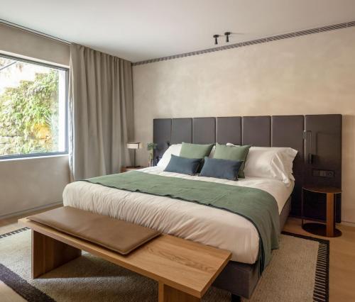 Ένα ή περισσότερα κρεβάτια σε δωμάτιο στο Hotel Ur Bare