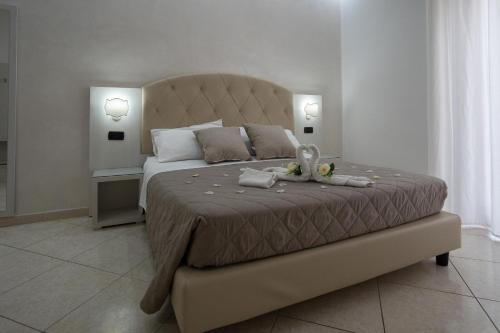 Katil atau katil-katil dalam bilik di B&B Il Gabbiano