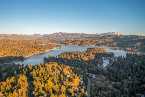 an aerial view of a lake in the fall at Hot Tub-EV-AC-Kid Friendly-Arcade Game-Lake Access in Lake Arrowhead