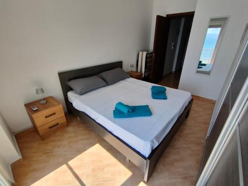 A bed or beds in a room at Seaview Vlora