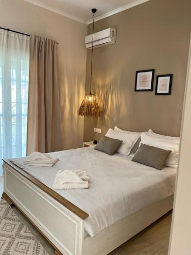 Postel nebo postele na pokoji v ubytování Villa Sandra