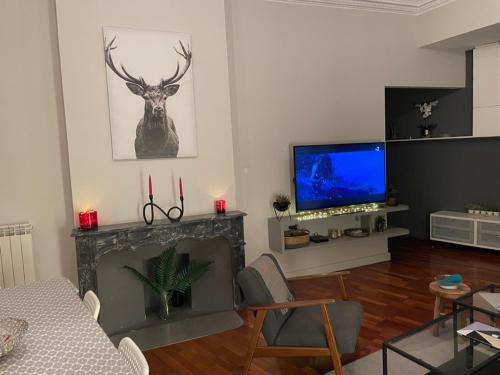 Televízia a/alebo spoločenská miestnosť v ubytovaní La Perle de Toulon