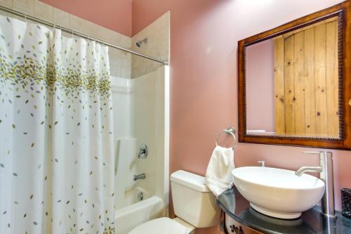 a bathroom with a sink and a toilet and a shower at Mountain View and Fire Pit Rustic Marshall Getaway! in Marshall