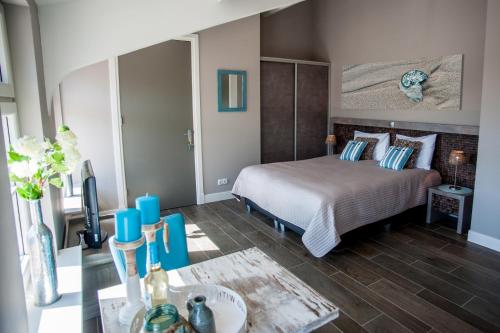 Letto o letti in una camera di Hof van Alexander Boutiquehotel