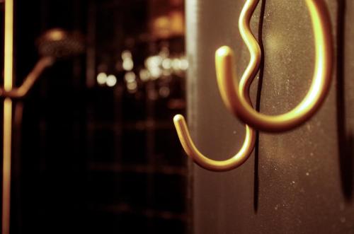 a close up of a door handle on a door at Das Altschwabing - Munich Boutique Hotel in Munich