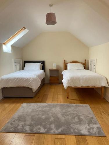 Postel nebo postele na pokoji v ubytování Stewarts House