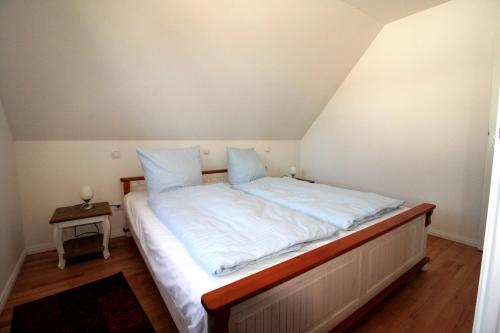 Giường trong phòng chung tại Wohnung-Salzaster