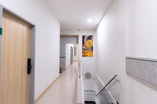 Fotografie z fotogalerie ubytování Urbanview Hotel R House Batam by RedDoorz v destinaci Jabi