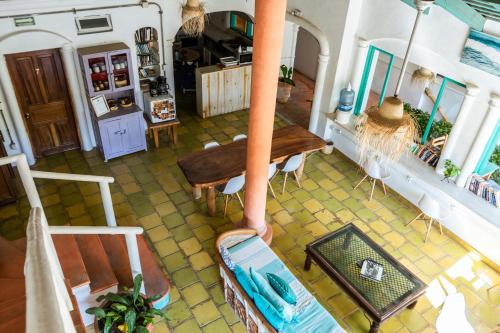an overhead view of a living room with a table at Sayulita Central Hotel in Sayulita