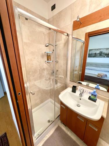 a bathroom with a shower and a sink at Apartment Donatello in Mestre