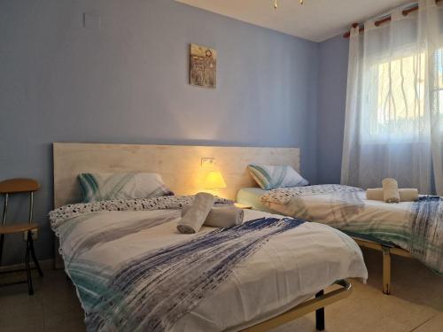 Posteľ alebo postele v izbe v ubytovaní Riumar "Conchita", 200m to beach, private pool, On-Site-Service, dog beach