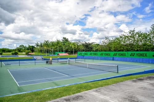 two tennis courts on a tennis court at Laguna Lake House - Private Pool - Sleeps 12 - Elegant in Playa Blanca