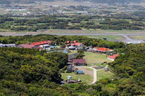 an aerial view of a small town with a farm at Goto Conkana Kingdom in Goto