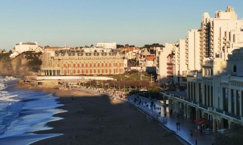 an aerial view of a beach and buildings at Studio AppartHôtel OCEAN 7, Plage, Piscine, Terrasse in Biarritz