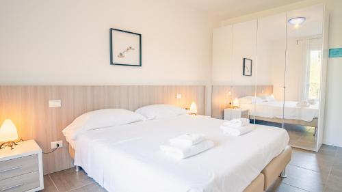 En eller flere senge i et værelse på Tra le Vigne di Peschiera - Italian Homing
