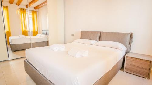 Postel nebo postele na pokoji v ubytování San Giovanni in Valle - Italian Homing