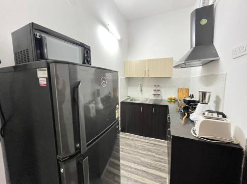Kuchyň nebo kuchyňský kout v ubytování BedChambers Serviced Apartment, Jubilee Hills