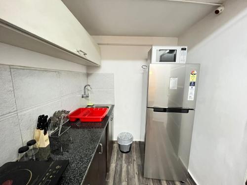 Kuchyň nebo kuchyňský kout v ubytování BedChambers Serviced Apartment, Jubilee Hills