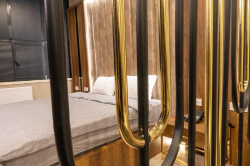 Ένα ή περισσότερα κρεβάτια σε δωμάτιο στο Anatolia Luxury Hotel