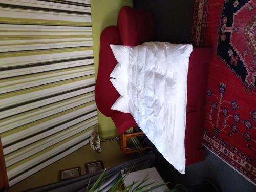 En eller flere senge i et værelse på Haus "Asgard"