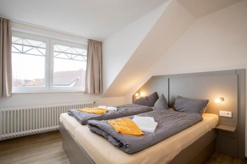 Postel nebo postele na pokoji v ubytování Uhlenkamp Appartement -1- im UHLENKAMP