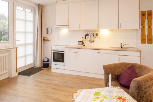 Una cocina o cocineta en Uhlenkamp Appartement -5- im UHLENKAMP