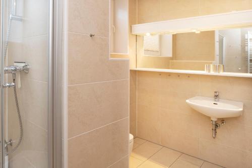 Un baño de Uhlenkamp Appartement -5- im UHLENKAMP