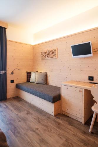 TV a/nebo společenská místnost v ubytování Hotel Piccola Baita