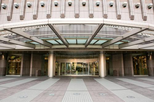 an external view of a building with a lobby at Ambassador Hotel Hsinchu in Hsinchu City