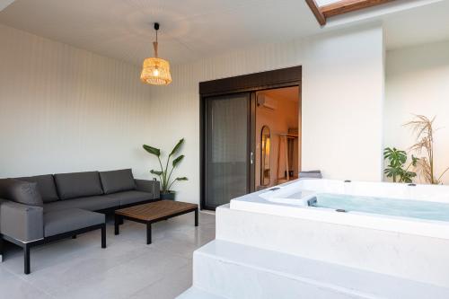A seating area at Isla Luxury Apartments - Private Hot tub - 100m from beach