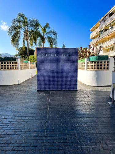 a sign for the australian embassy in front of a building at Private garden 100 m from the sea in Benicàssim