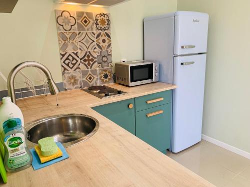 A cozinha ou cozinha compacta de Brise des Pins